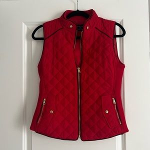 Red small women’s puffer vest with gold accents